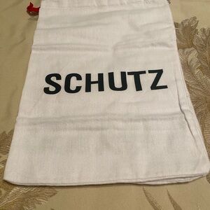 SCHUTZ White Dust Bag with Black Logo..just about 10x15 size. 4 pc